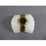 A Lady's 18k Gold Plated Raymond Wiel Wrist Watch, the watch having a black and white stone face,