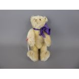 A Circa 1913 White Steiff Teddy Bear, with original button to right ear, approx 18 cms, this
