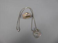 A Silver (925) Necklace and Heart Pendant together with a silver ring, both stamped Tiffany & Co,