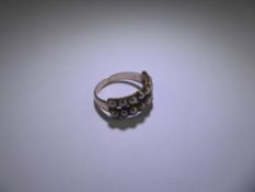 An Antique 9ct (tested) Yellow Gold and Pearl Ring, the ring set with two rows of high-lustre