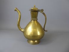 A Mughal Bronze Ewer, of typical pear shaped form.