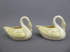 Two Mid-20th Century Belleek Porcelain Swans, bearing back stamp for period 1946-55.
