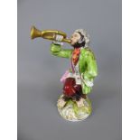 A Meissen 'Monkey Band' Figurine, with crossed swords to base, approx 12.5 cms.