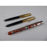 Three Vintage Fountain Pens, including two Parker and one other.