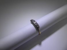 An 18ct Yellow Gold and Platinum Five Stone Diamond Ring. Approx 16 pts old cut dias, size Q, approx