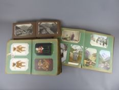 Three Albums of Victorian and Later Post Cards, including sea-side, black and white and comic post
