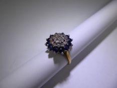 An 18ct Yellow Gold Diamond and Sapphire Cluster Ring, size N, approx 70 pts, 8 ct dias, 12 x 3mm
