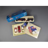 A Trio of Tour de France Die Cast Corgi Cars, including a Ferrari, Jaguar Mark II and a Mini, in