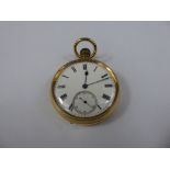 An 18ct Yellow Gold Gentleman's Open Face Pocket Watch. The watch having a white enamel face with