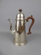 A Sterling Silver Coffee Pot, with fruit wood handle and finial, Birmingham hallmark, dated 1977, mm