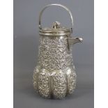 An Indian Silver Coffee Pot, with foliate decoration, approx 16 cms, approx 228 gms.