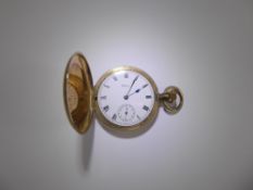 A Gentleman's Waltham Gold Plated Full Hunter Pocket Watch, having white enamel face with Roman