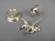 A Silver Vietnamese Tea Strainer depicting a fisherman (af), approx 64.4 gms.