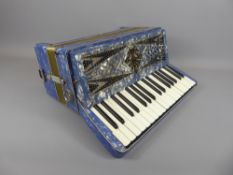 A Vintage Geraldo Italia 120 Bass 30 Key Piano Accordion, in working order, in blue mother of