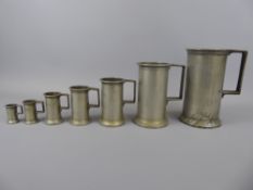 Seven French 19th Century Pewter Measures, comprising Litre, Demi-Litre, Double Decilitre,