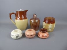 Miscellaneous Items of Pottery, including a money box, an unlidded pot with marks beneath, a