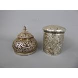 An Antique Persian Pierced Silver Lidded Pomander. The dome shaped pomander decorated with animals