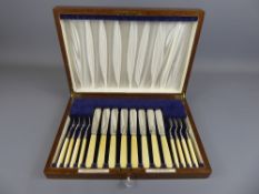 A Set of Silver Bone-Handled Fish Knives and Forks, in the original box.