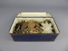 A Tin Containing Approx Sixty Various Military Badges and Insignia.