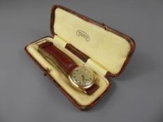 A Vintage Gold Pierce Swiss Made Wrist Watch, the watch case inscribed 'Presented to E.S Taylor