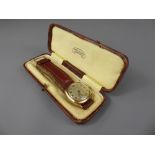 A Vintage Gold Pierce Swiss Made Wrist Watch, the watch case inscribed 'Presented to E.S Taylor