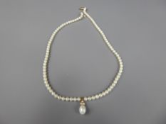 An 18ct Yellow Gold Diamond and Pearl Necklace, the necklace having a tear drop pearl with three