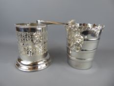 A Viners Sheffield Plate Ice Bucket, together with a silver plated bottle holder. (2)
