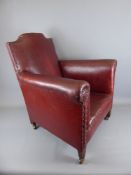 A Vintage Child's Leatherette Arm Chair with studding to elbow rests, approx 62 cms.