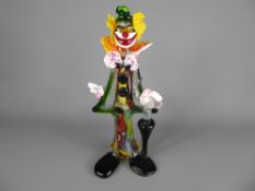 A Colourful Murano Glass Figure of a Clown, approx 32 cms high.