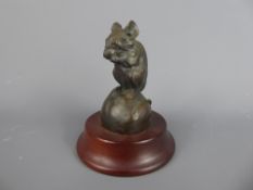 A Mid-20th Century Bronze Casting of a Field Mouse, raised on a mahogany plinth, approx 13 cms.