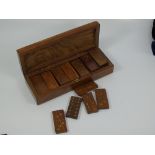 DOMINOES IN WOODEN BOX WITH BRASS INLAID DECORATION