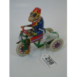 TIN PLATE MONKEY ON A BIKE