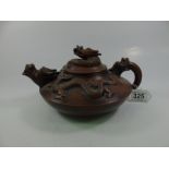 ORIENTAL TERRACOTTA TEA POT WITH DRAGON DECORATION