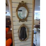 2 OVAL MIRRORS IN ORNATE FRAMES