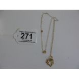 YELLOW METAL PENDANT MARKED OR14K & CHAIN 1.85 GRAMS