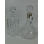 2 DECANTERS, 1 WITH HALL MARKED SILVER RIM
