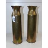 PAIR TRENCH ART DECORATED SHELL CASES 32cms