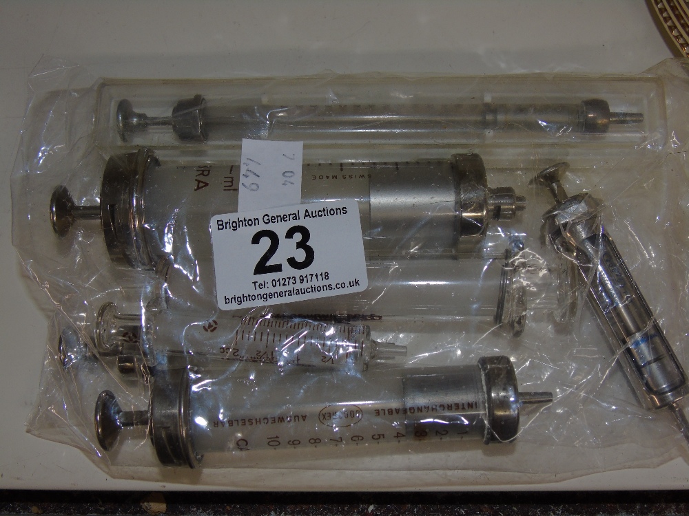 7 VINTAGE SYRINGES