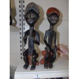 PAIR OF CARVED WOODEN AFRICAN FIGURES