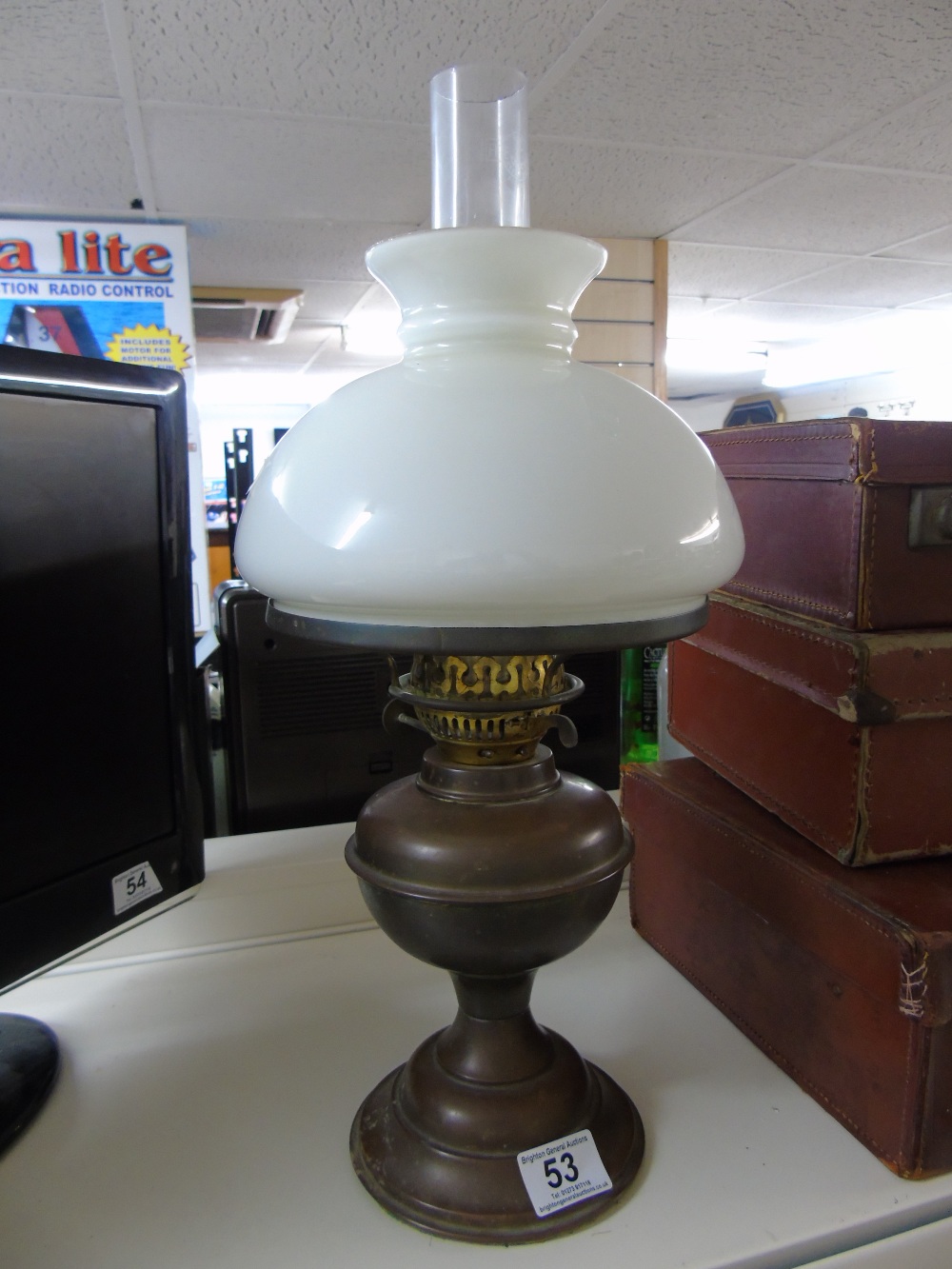 BRASS BASED OIL LAMP WITH GLASS SHADE