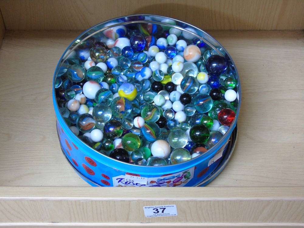 TIN OF MARBLES