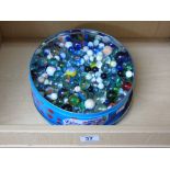 TIN OF MARBLES