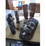 8 CARVED AFRICAN ITEMS INCLUDING A MASK