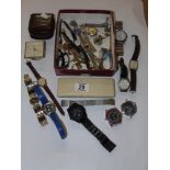 BOX OF WATCHES AND A TRAVEL CLOCK