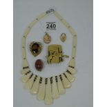 QUANTITY OF COSTUME JEWELLERY INCLUDING A BONE NECKLACE