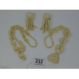 QUANTITY OF HAND CARVED BONE JEWELLERY