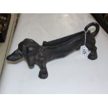 CAST IRON BOOT SCRAPER IN THE FORM OF A DACHSHUND