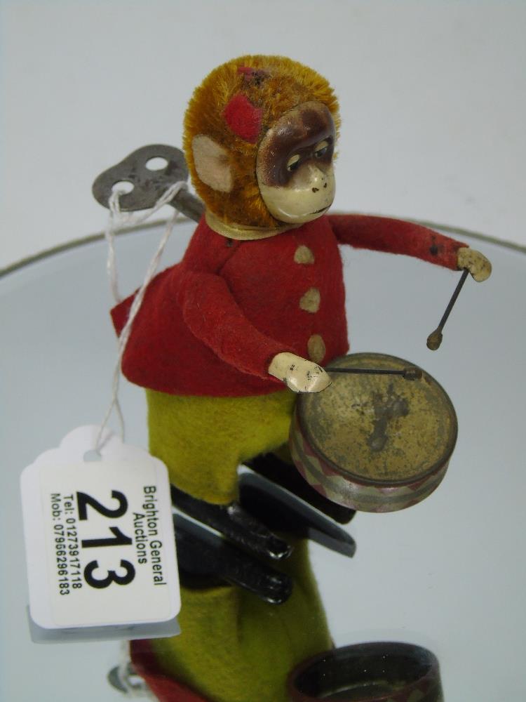 SCHUCO CLOCKWORK MONKEY PLAYING A DRUM