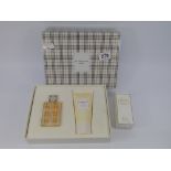 BURBERRY BRIT, BODY LOTION & EAU DE TOILETTE & MISS DIOR EAU DE TOILETTE