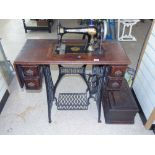 VINTAGE SINGER SEWING MACHINE IN FITTED TREADLE TABLE